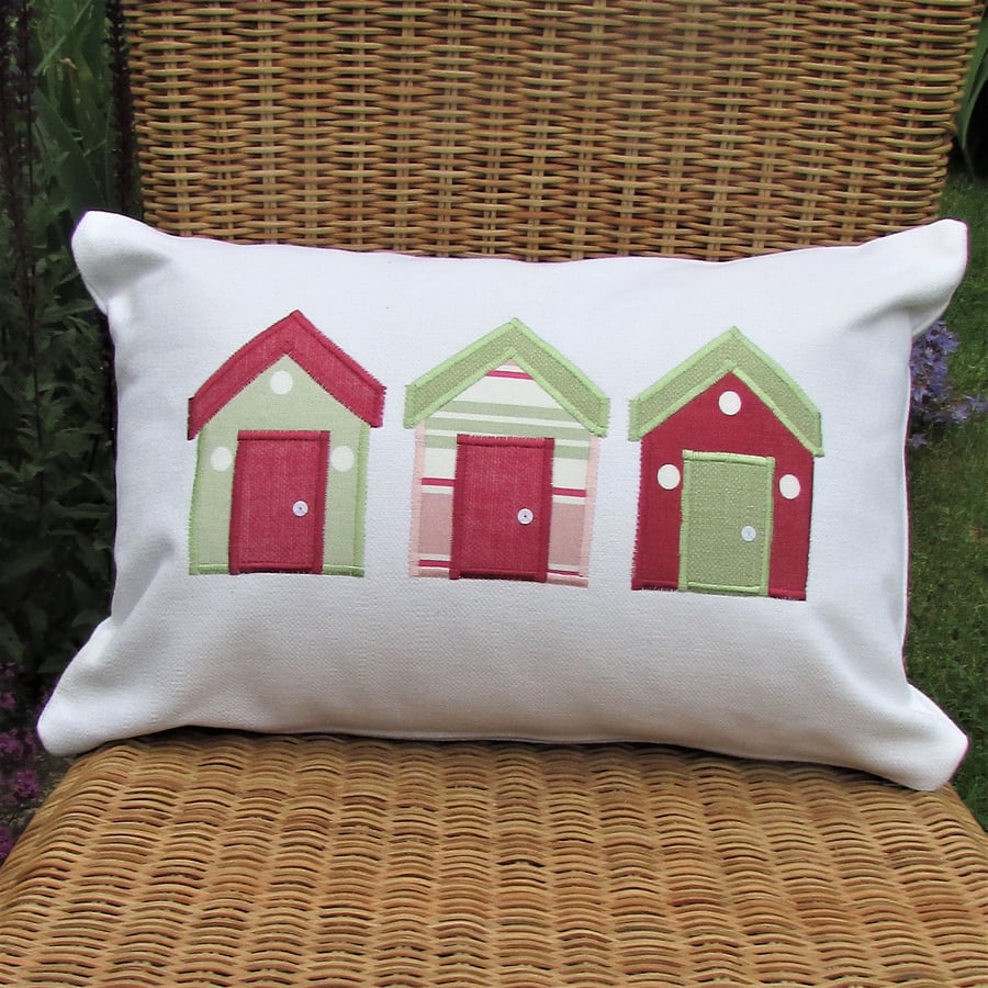 Beach huts cushion - Rectangular, ivory with pastel pink and green huts