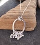 Sterling silver 'hug' pendant necklace, hammered silver, silver twists pendant