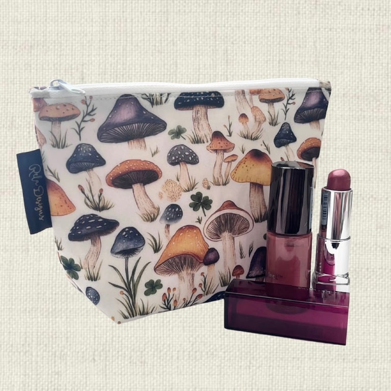 Cosmetic bags mushrooms and clover.