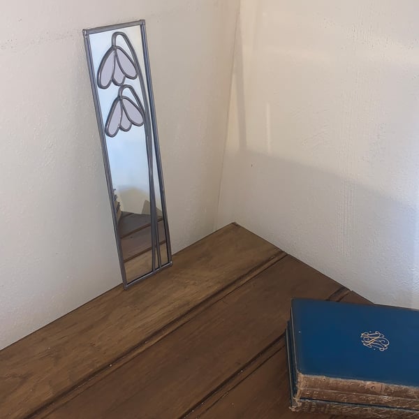 Lead Mirror. Snowdrop design.