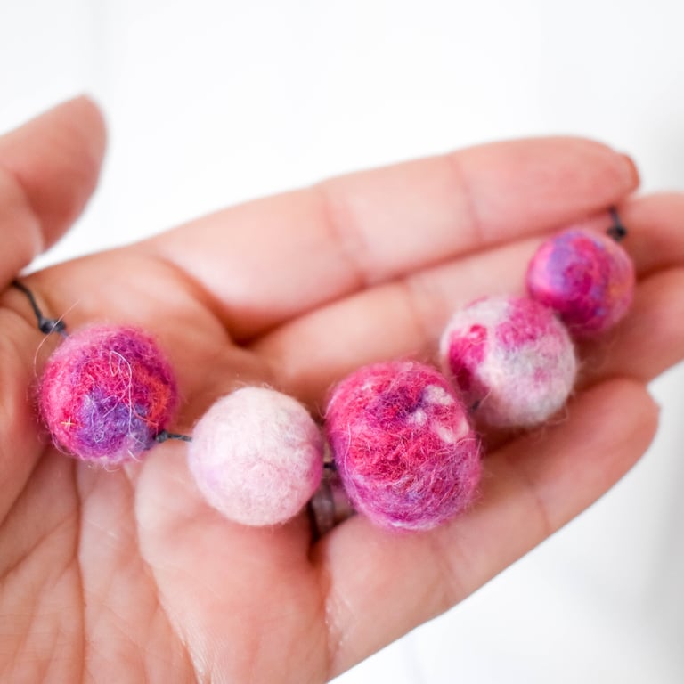 Felted bead necklace in pink and purple wool
