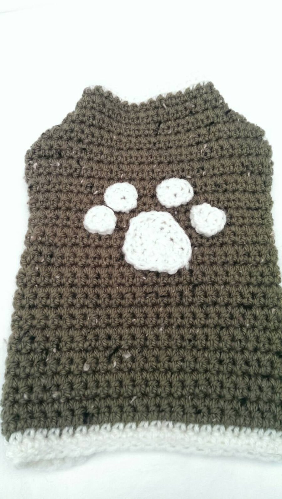 Green and cream trim dog sweater with paw print applique for small sized dog