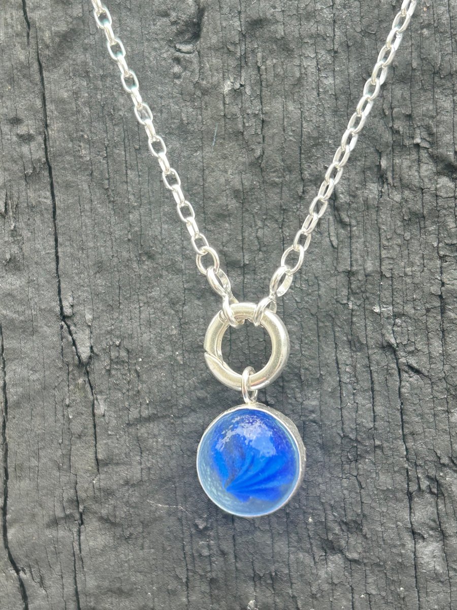 spinning sea marble silver pendant