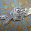Fish brooch, pewter pin.