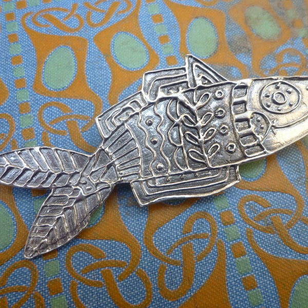 Fish brooch, pewter pin.