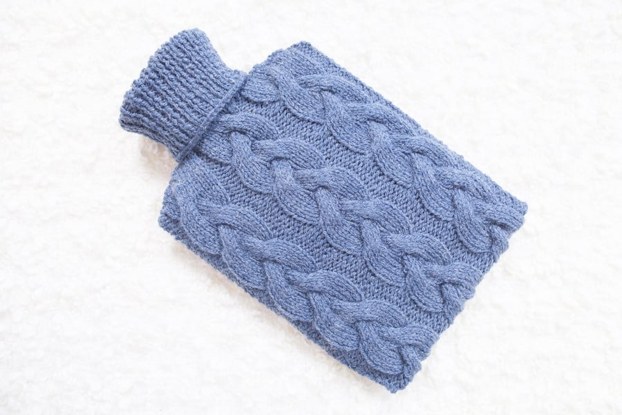 Hand knitted hot water bottle cover, cosy in denim. Rustic bedroom, home decor.