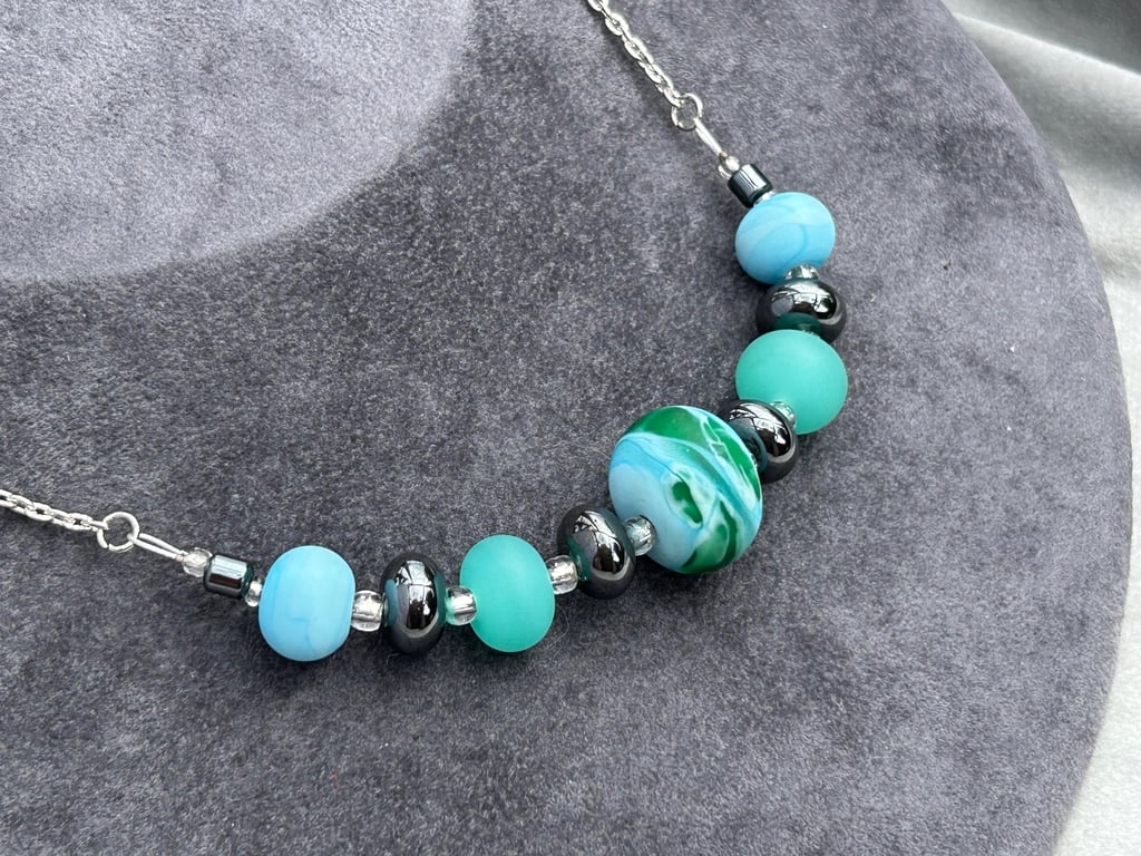 blue and green swirly seaglass style lampwork beaded necklace