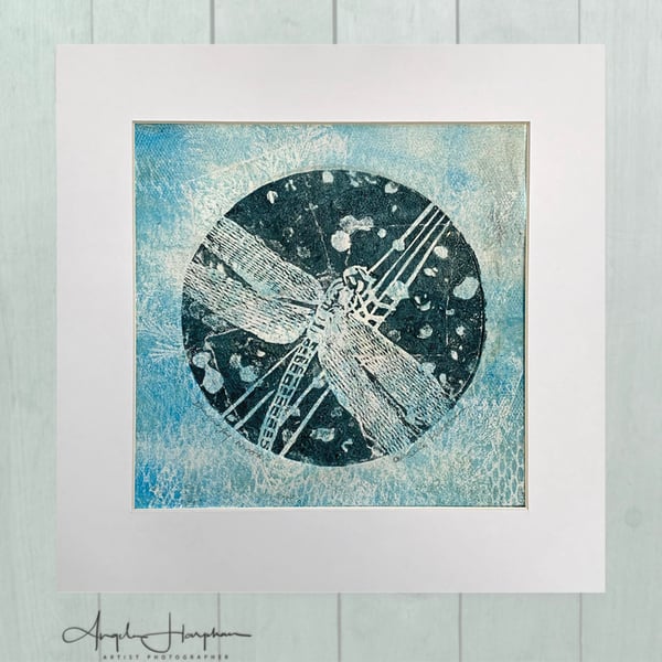 Dragonfly Moon Blue Lino Print on Collaged Mono printed Paper 