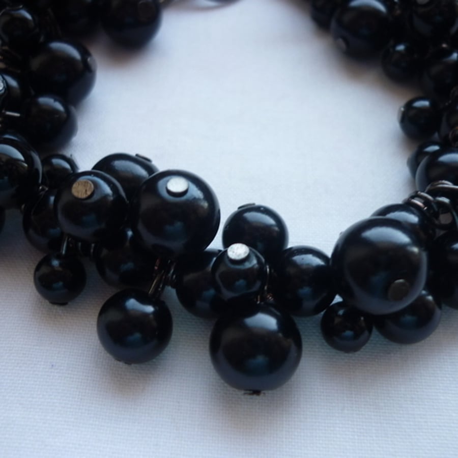JET BLACK PEARL BRACELET. 104