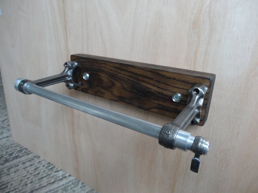 A one off rustic motorcycle themed kitchen roll holder
