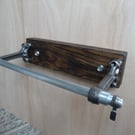 A one off rustic motorcycle themed kitchen roll holder