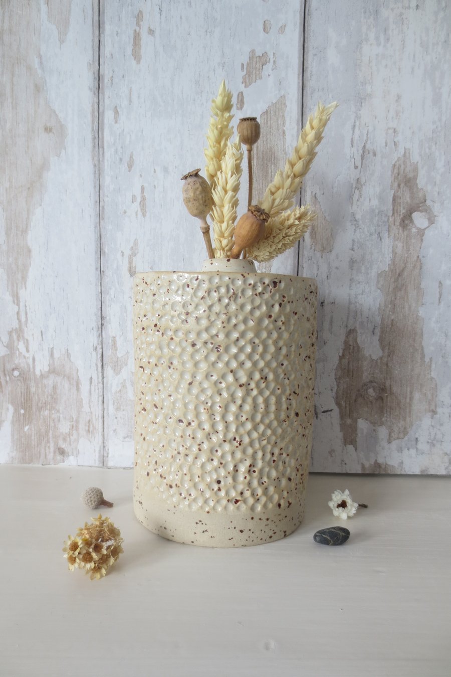 Hand-built speckled pottery vase in satin white glaze
