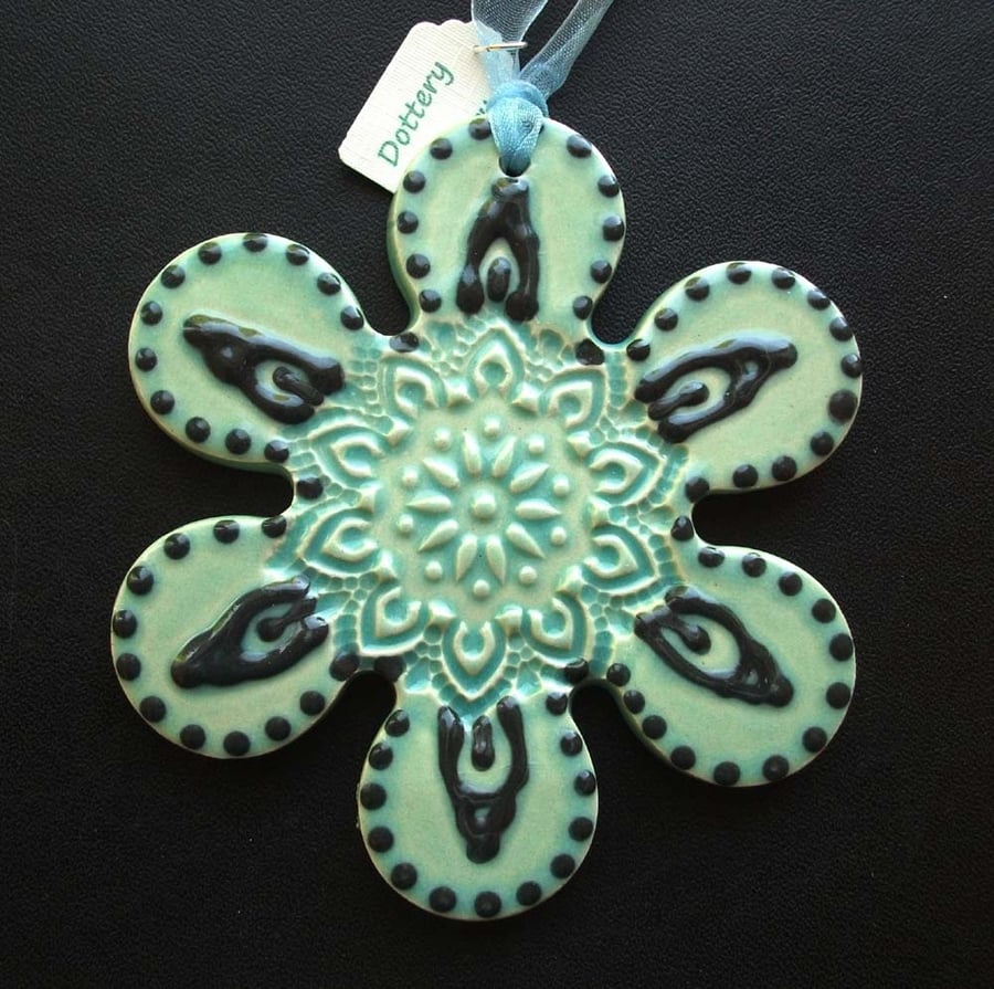 Bright ceramic flower decoration.
