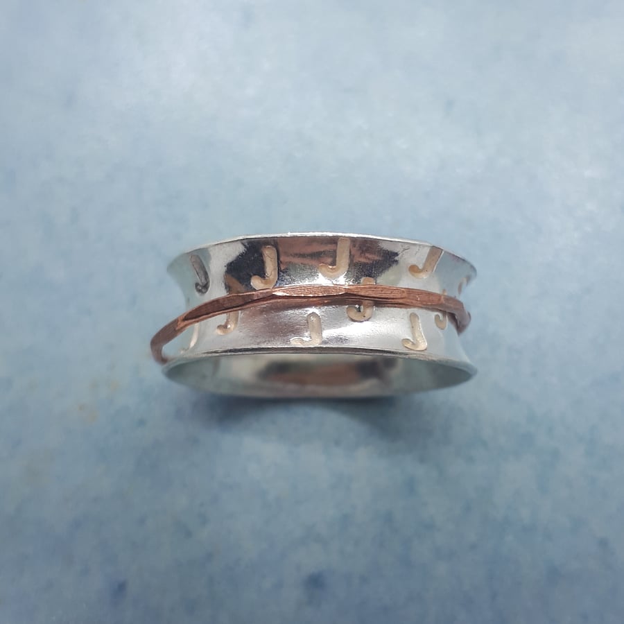 Silver single initial spinner ring