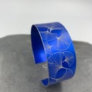 Anodised aluminium ginkgo leaf cuff in dark blue