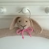 Hand knitted childrens Bunny Clothes Hanger with pink bow tie