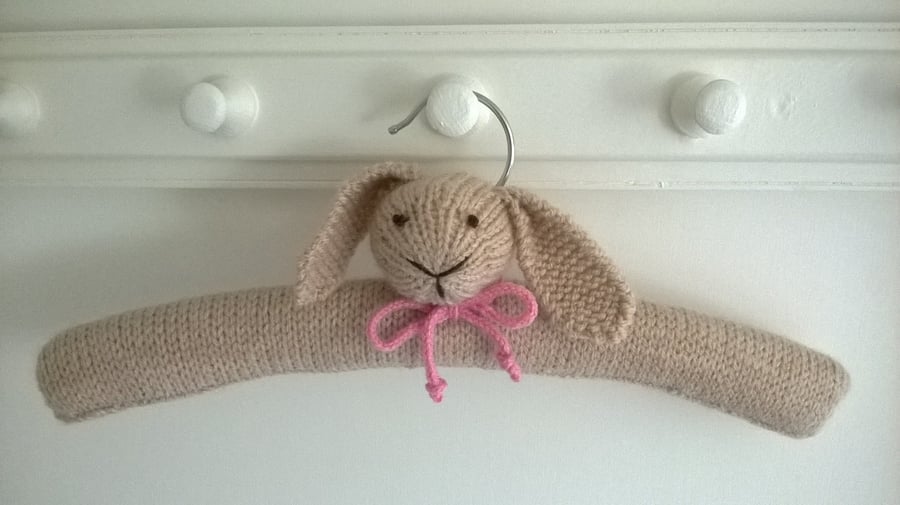 Hand knitted childrens Bunny Clothes Hanger with pink bow tie