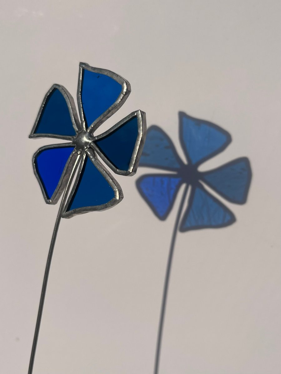 Blue stained glass flower stem