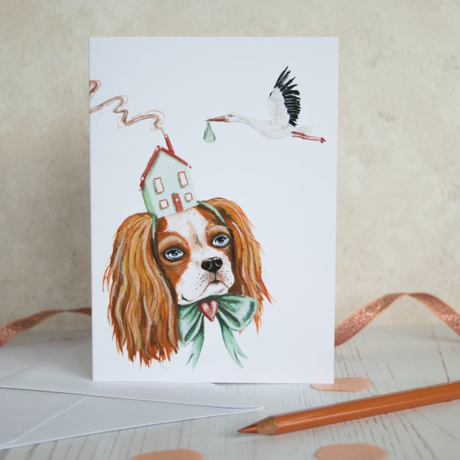 New baby note card featuring a Cavalier King Charles spaniel dog with a stork