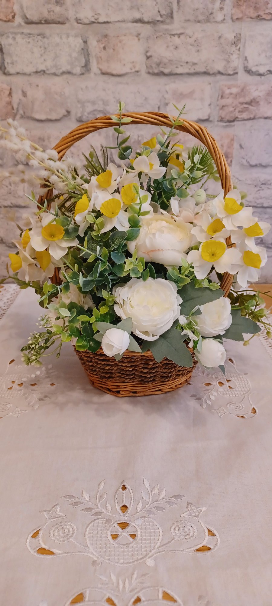 Vintage basket of daffodils and roses
