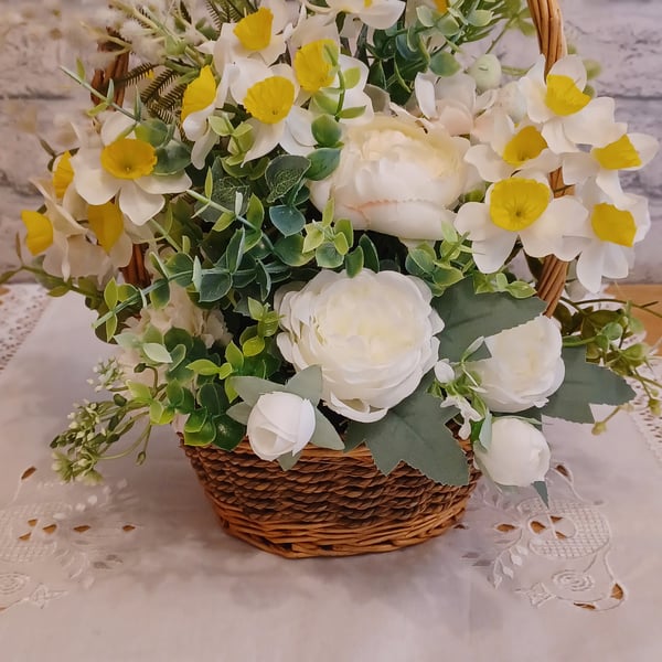 Vintage basket of daffodils and roses