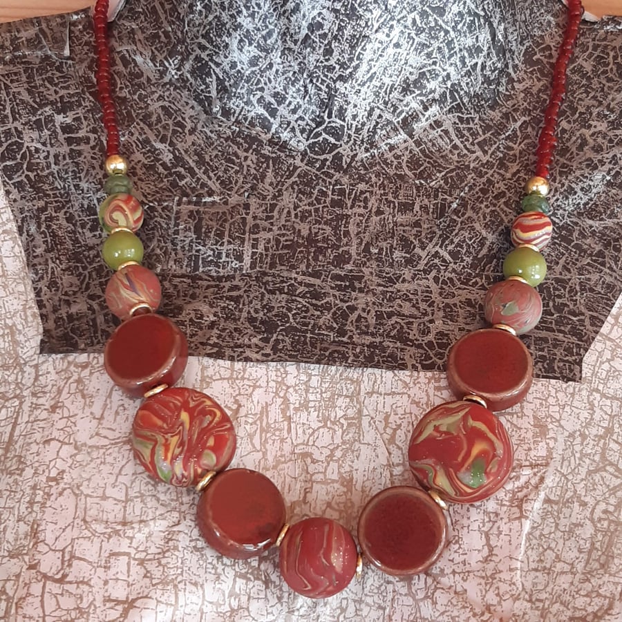 Brick red, green and yellow disc necklace  