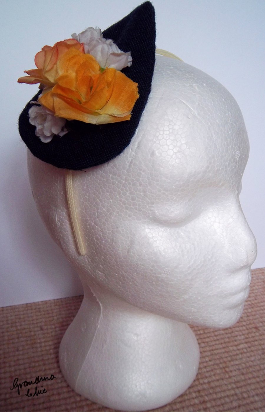 Yellow floral fascinator 