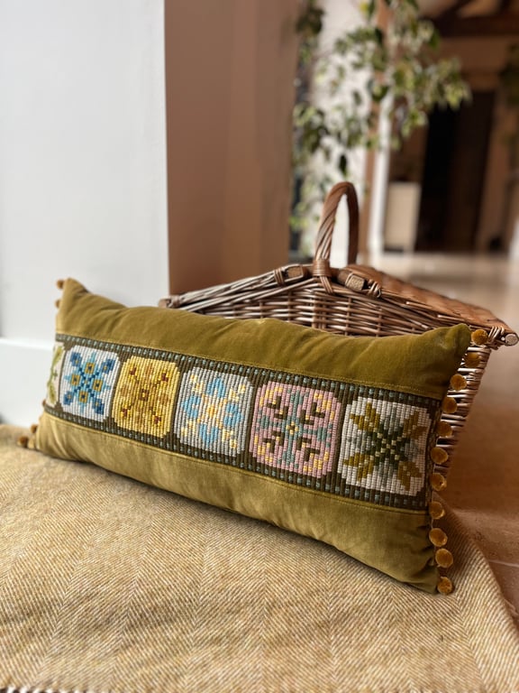 Needlepoint and velvet cushion cover with pompom trim