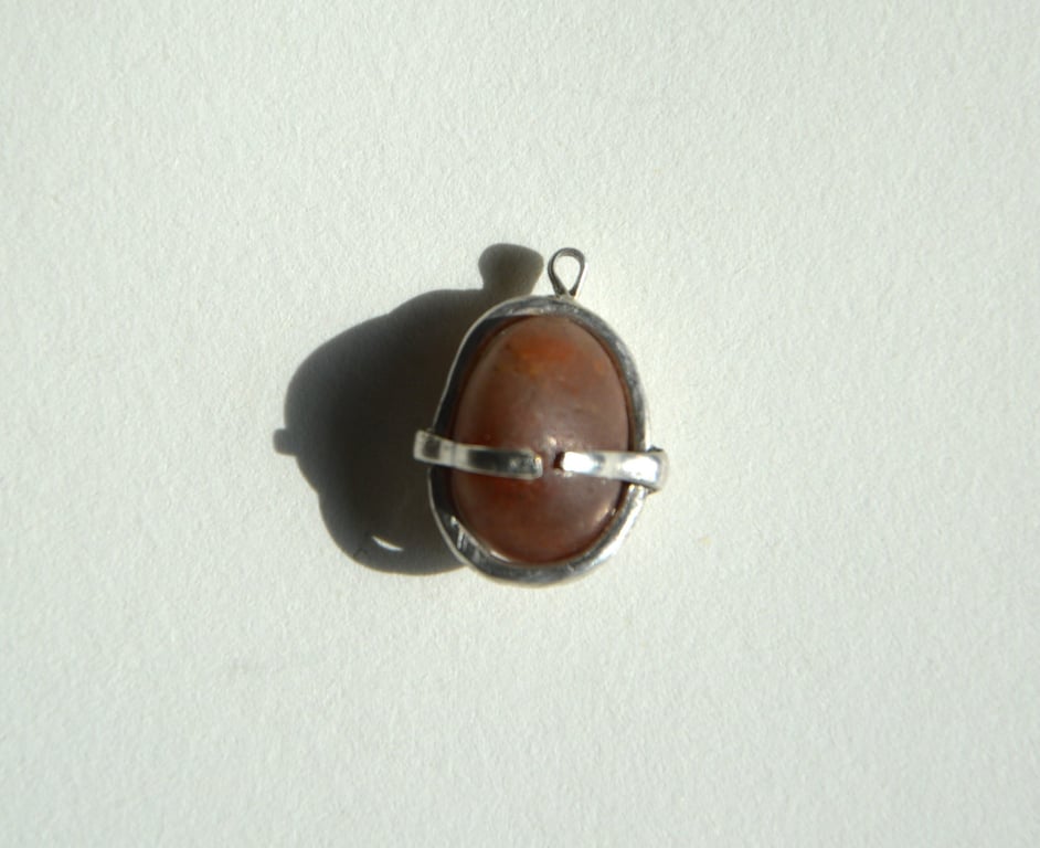 2 rings brown quartz pendant