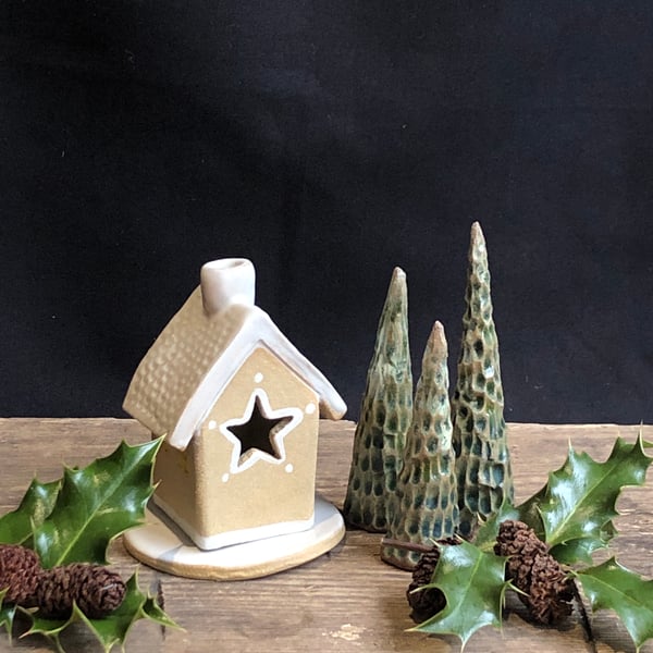 Small gingerbread star house incense burner with trio of trees