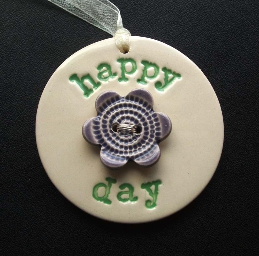 Ceramic decoration Happy Day with flower button