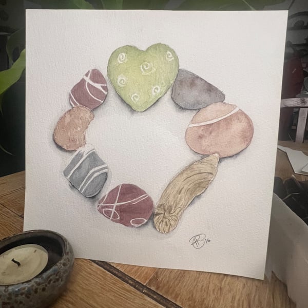 Coastal keepsakes. Pebbles and driftwood stone circle and heart watercolour