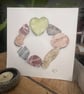 Coastal keepsakes. Pebbles and driftwood stone circle and heart watercolour