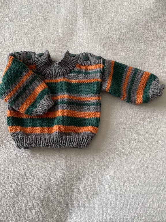 Multicoloured striped baby jumper in a luxurious yarn
