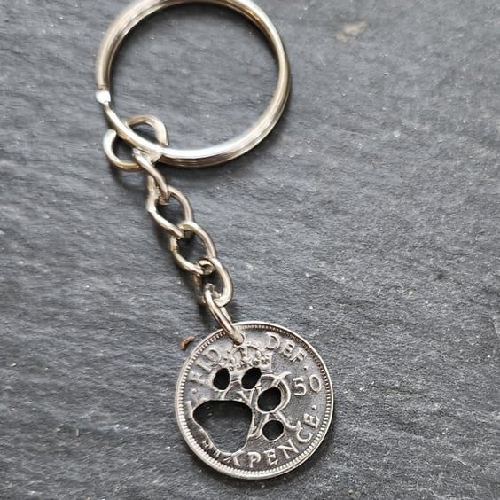 Upcycled 1950 sixpence coin keyring or bag charm with pierced paw