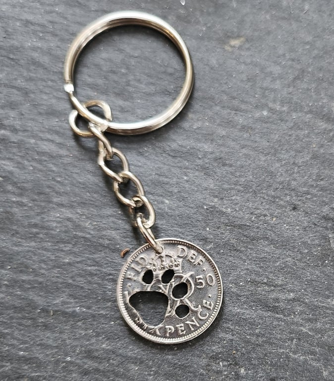 Upcycled 1950 sixpence keyring or bag charm with pierced paw