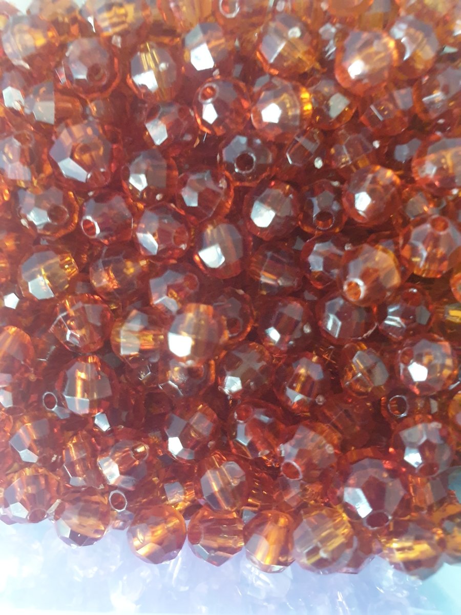 100 brown coloured faceted beads