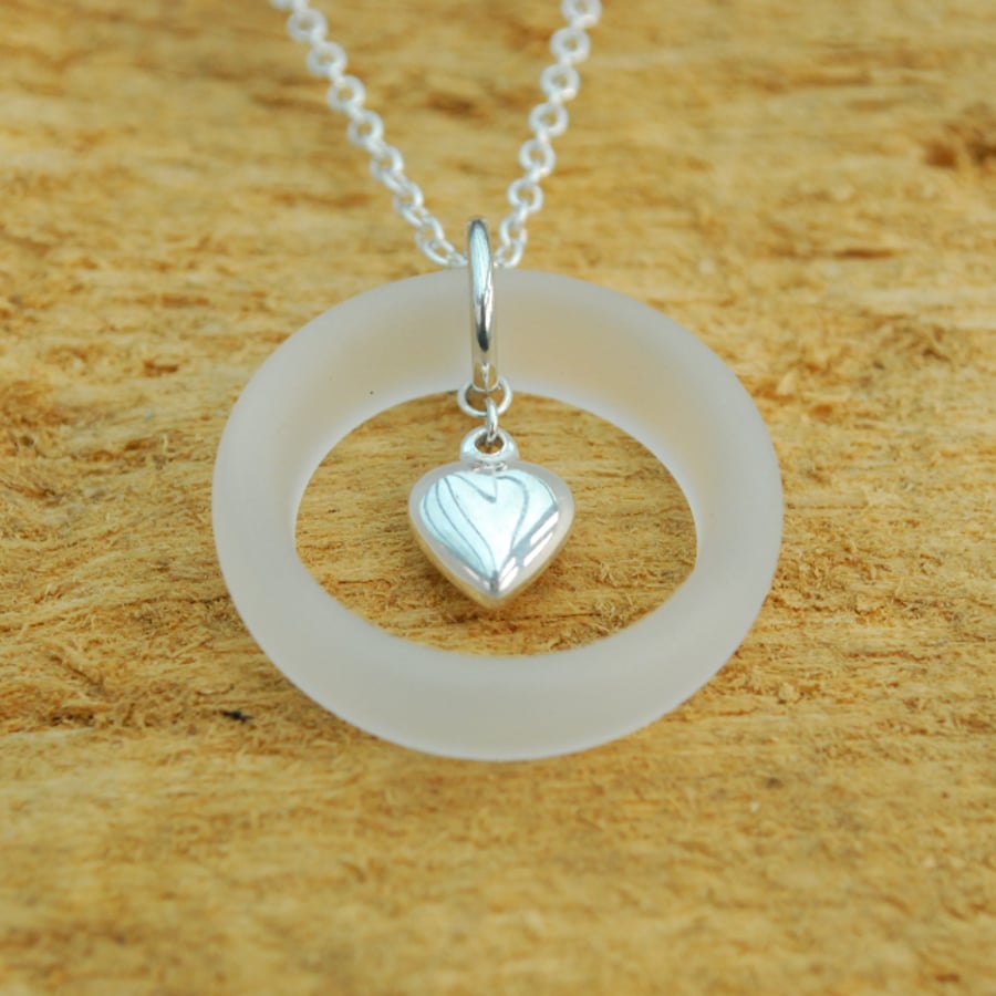 White glass ring with sterling silver heart