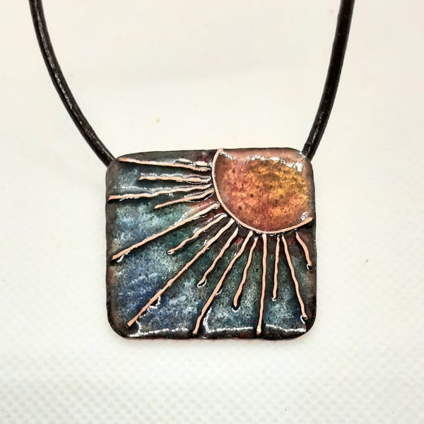 Sunburst enamelled square pendant on leather