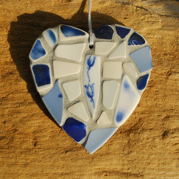 Beach pottery heart with tiny blue flowers