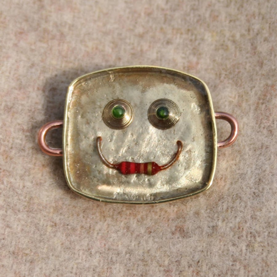 robot head brooch