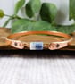 Bangle, Copper and Slodalite Bracelet with Stamped Flowers. Size 21cms