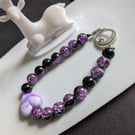 Purple&black beaded bracelet with heart, moon and star