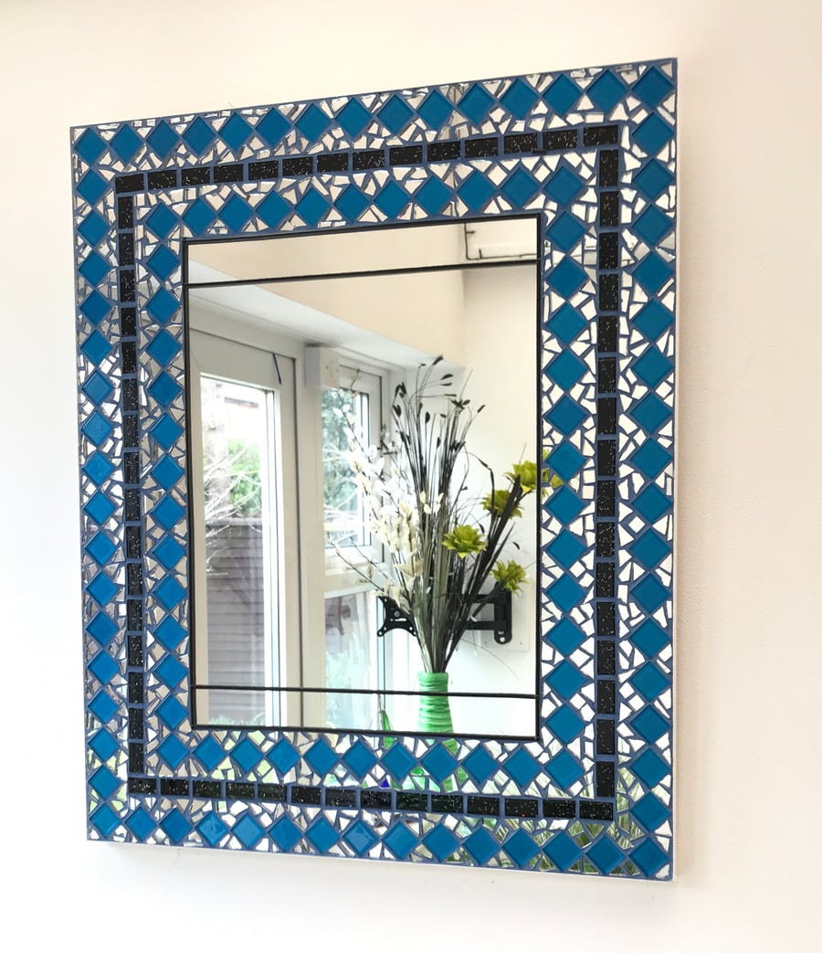 Mosaic mirror in blue and black glass tiles