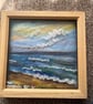 Beach scene with Seaglass , shells and  pottery pine frame sea, sky, beach 