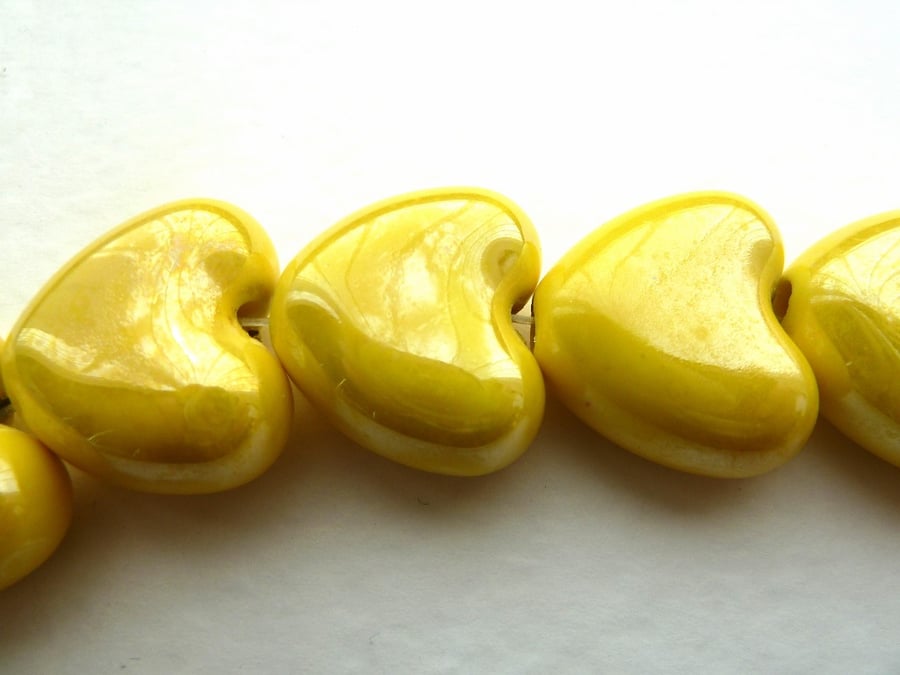 3 yellow ceramic heart beads