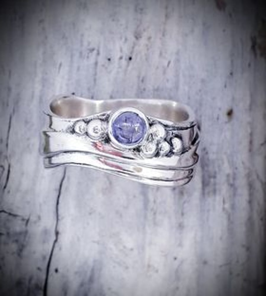 Medium Wave Ring with Tanzanite Size O and a half only