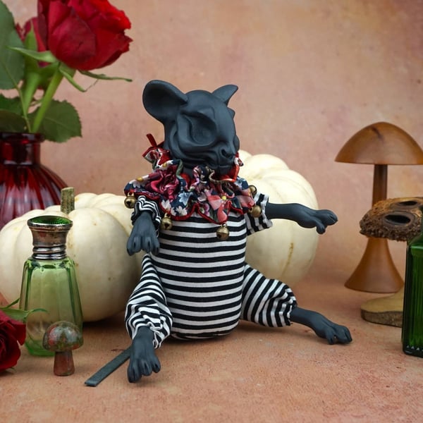 'Beezle', a porcelain and textile skull mouse doll.