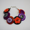 Orange, Black and Purple button bracelet 