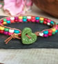 Multicoloured howlite bead and leather bracelet with green ceramic heart button - Image 9